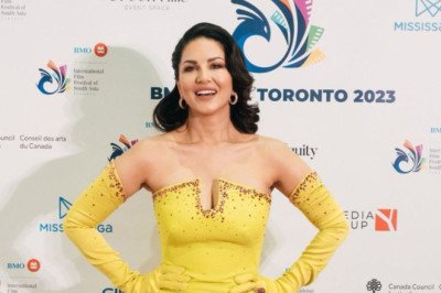 Sunny Leone Shines in Stunning Yellow Gown at IFFSA's Glittering Red Carpet Event